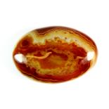 A lovely Chinese banded agate pebble touch stone, L. 7cm.