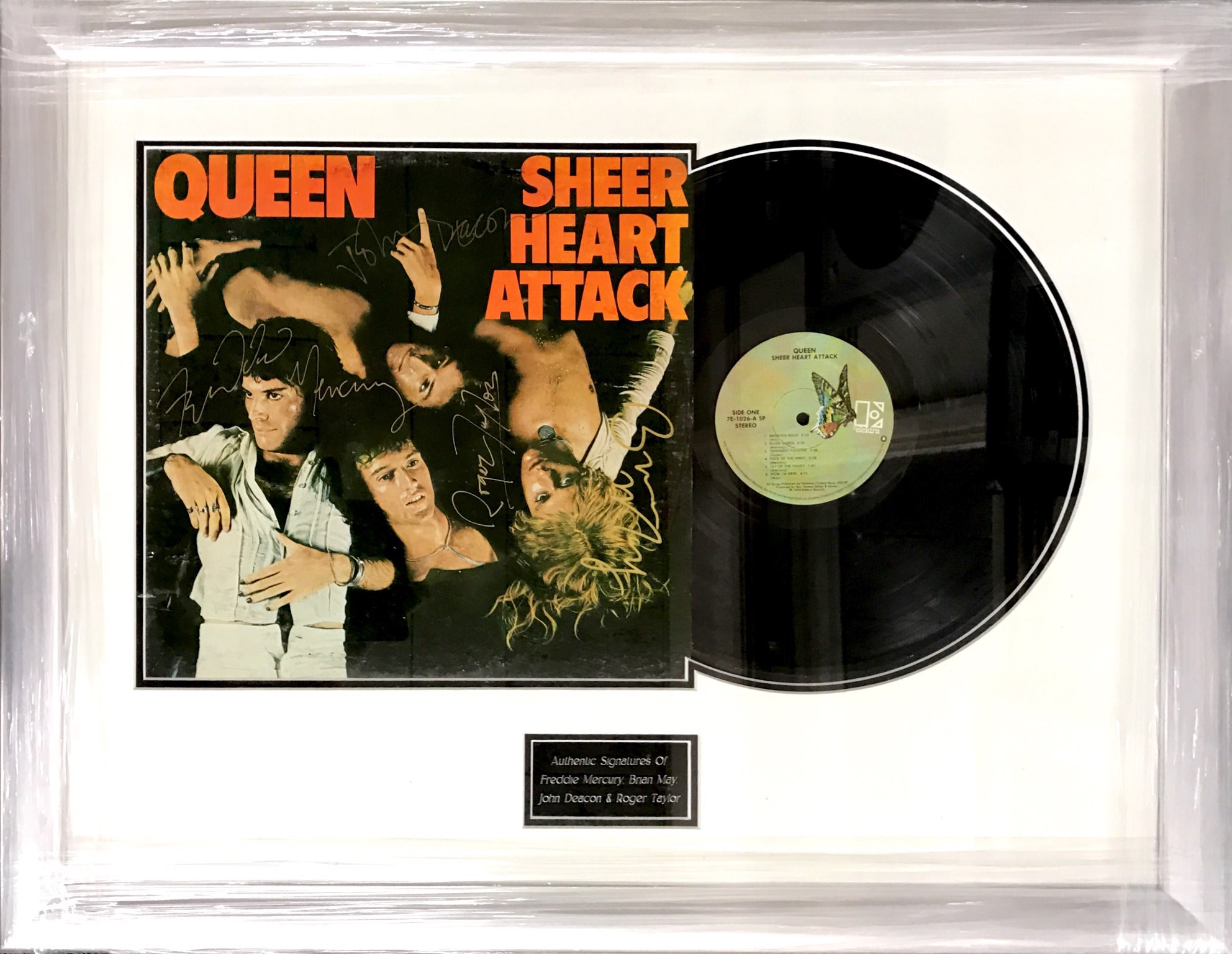 A Queen framed autographed "Heart Attack" LP record, 70 x 56cm.