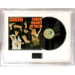 A Queen framed autographed "Heart Attack" LP record, 70 x 56cm.