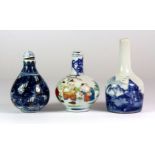 Three Chinese porcelain snuff bottles.