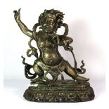 A Tibetan cast bronze figure of the guardian Deity Mahakala, H. 31cm.