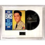 An Elvis Presley framed autographed "G. I. Blues" LP record, 70 x 56cm.