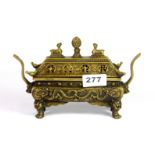 A small Tibetan bronze temple style censer decorated with dragons, W. 21cm, H. 13cm.