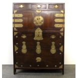 An early 20th century oriental hardwood and brass mounted cabinet, 76 x 36 x 109cm.