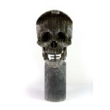 A superb plasma cut steel articulated skull sculpture on pedestal signed Paulo for Paul Goodyear