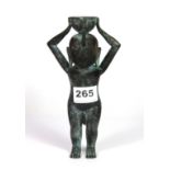 A 19th century Indian bronze figure holding an oil pourer, H. 19cm.