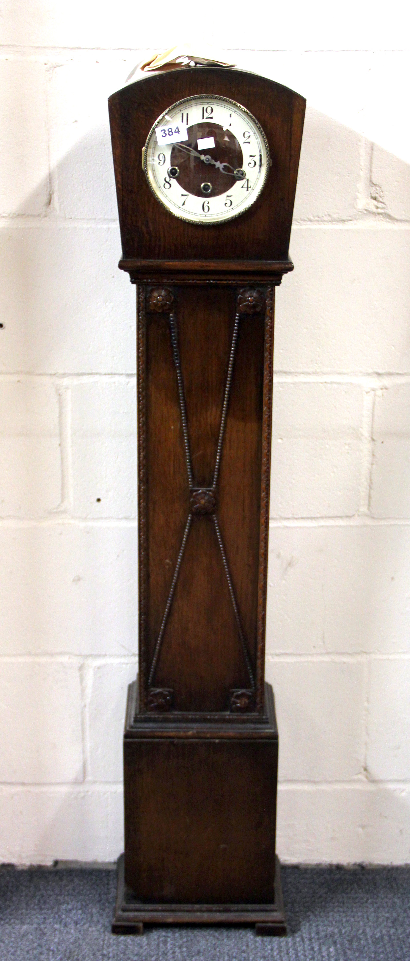 An Art Deco oak grand daughter clock, H. 126cm.
