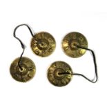 A pair of Tibetan bronze tingshaws (temple bells), Dia. 6.5cm.