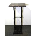A marble topped cast iron plant stand / table, 44 x 44 x 97cm.