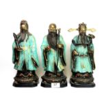 A set of three Chinese cold painted and gilt bronze figures of Fu, Lu and Shou, H. 29cm.