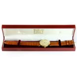 A gentleman's 9ct gold Longines manual wrist watch.