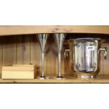 A silver plated ice bucket, two champagne goblets and a champagne bottle opener.