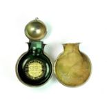 A George V hallmarked silver smelling salts bottle holder, engraved with swag decoration, makers