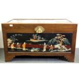 A mid 20th century hardwood box, hand painted, inset with mother of pearl and other stones, 103cm