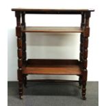 An Edwardian oak trolley bookstand, 64cm x 34cm x 79cm.