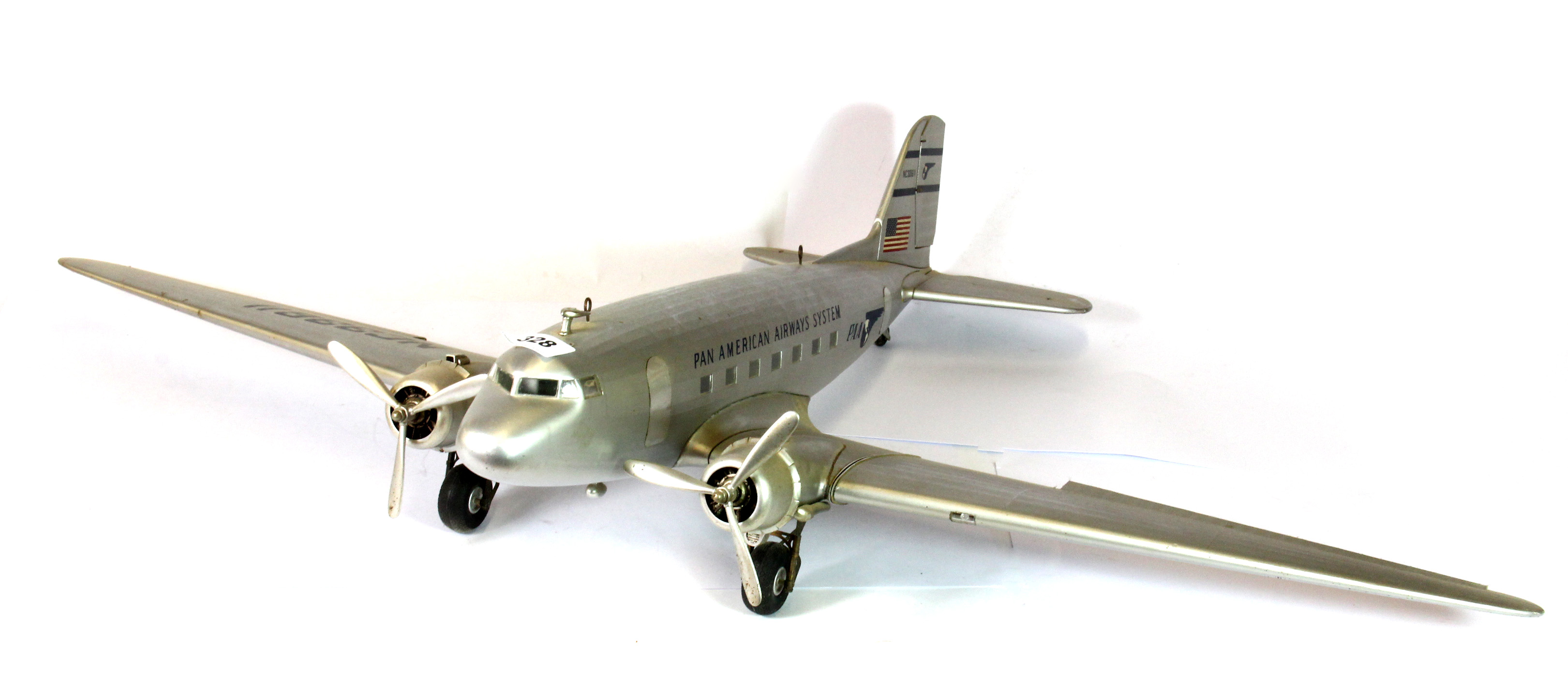 A large aluminium skinned model aircraft, L. 65cm, Wing span 100cm