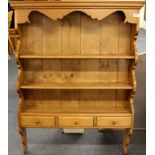 A wall mounted pine plate rack, W. 85cm H. 113cm.