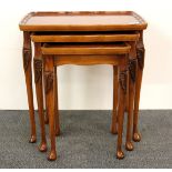 A nest of three coffee tables.