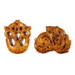 Two Archaic form yellow jade amulets of dragons, W. 7cm.