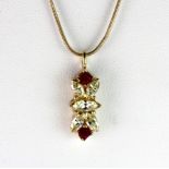 A yellow metal (tested 18ct gold) pendant set with fancy light yellow marquise cut diamonds (overall