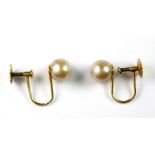 A pair of 9ct yellow gold screw back earrings.