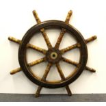 A large ships wheel, dia. 103cm.