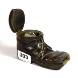 A 19th century carved wooden inkwell and stamp box in the form of a boot, W. 12cm.