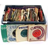 An extensive box of 45 rpm single records.