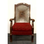 A 1920's cane backed armchair.