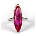 A lovely platinum ring set with a large marquise cut pink topaz (H.5).
