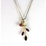 An 18ct yellow gold pendant set with diamonds, tourmaline, amethyst and kunzite on an 18ct gold