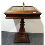 A cold painted Napoleonic design brass chess set and table with additional backgammon and draughts.