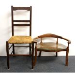 An unusual cane seated stool, with purpose cut glass shelf and a rush seated chair.