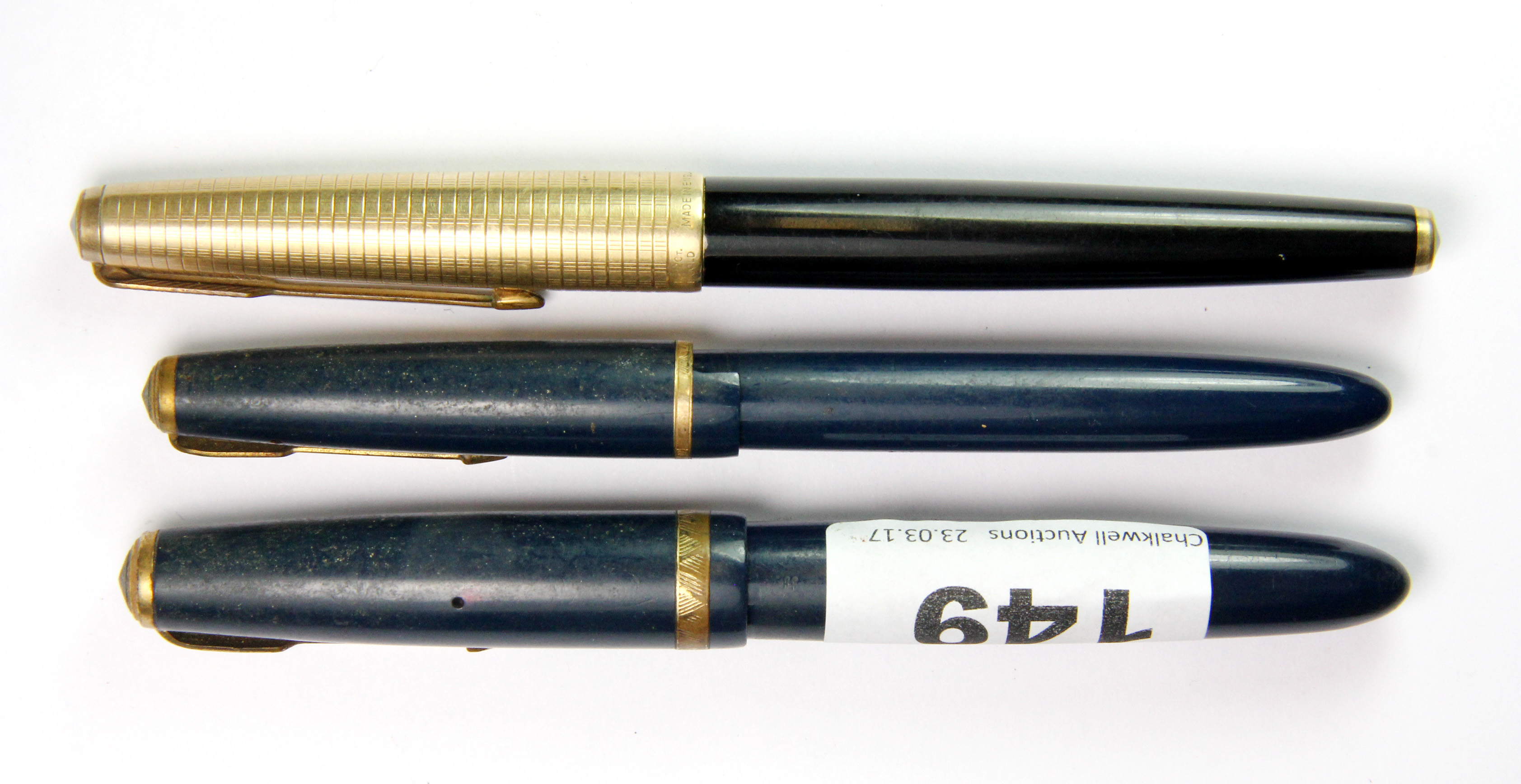 A Parker Dunfold fountain pen with 14ct yellow gold nib, together with two other Parker fountain