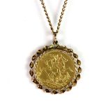 A yellow metal mounted (tested minimum 9ct gold) George V 1915 gold sovereign pendant on a 9ct