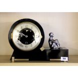 An Art Deco black lacquered and chrome mantle clock, H. 23cm.