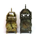 Two brass lantern clocks, tallest H. 28cm one with old electrical movement, the other with