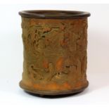 A Chinese carved bamboo brush pot with detailed decoration, H. 16cm, Dia. 14cm.