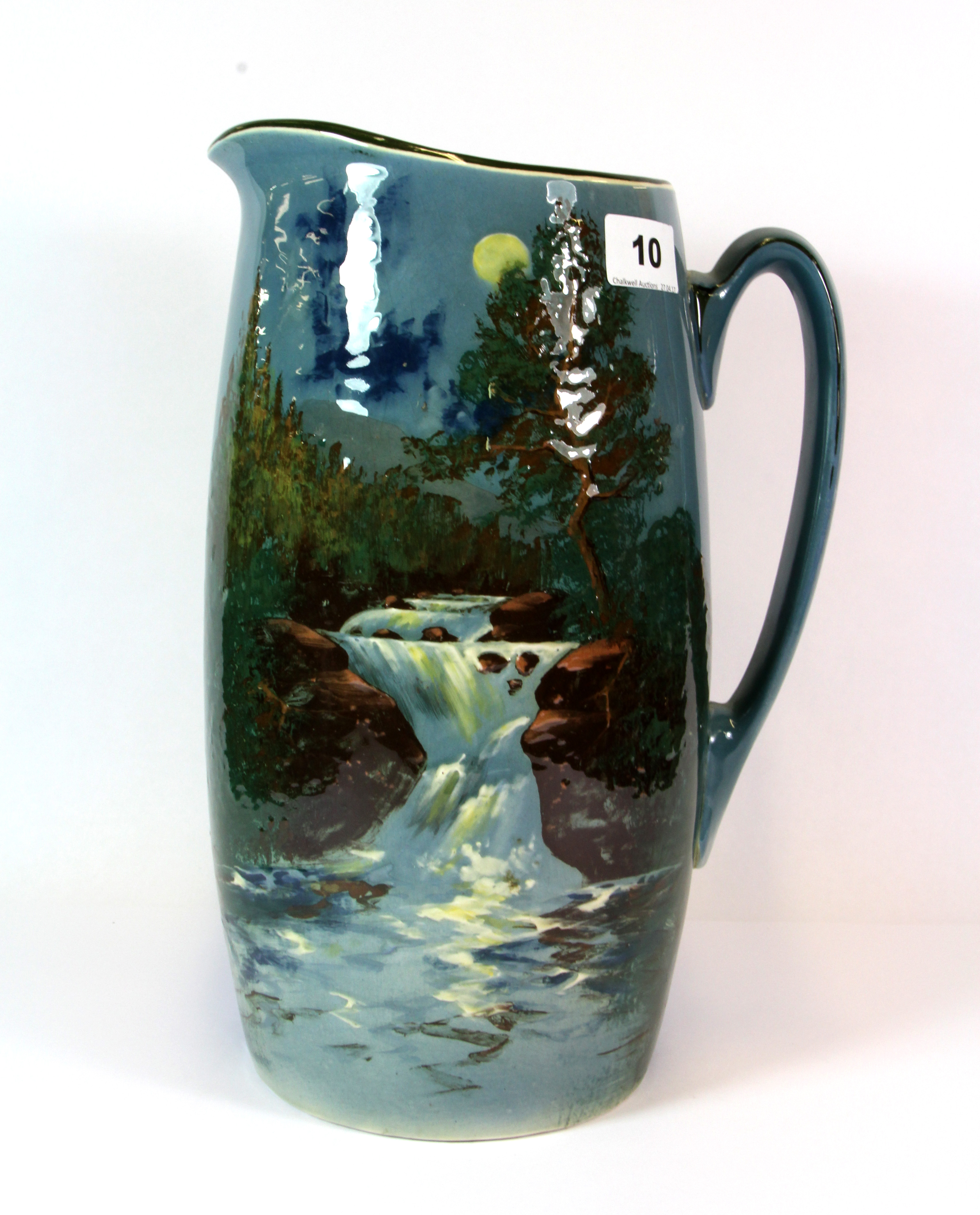 A large Royal Doulton hand painted jug, H. 32cm.