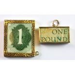 Two 9ct yellow gold bank £1 note charms.