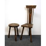 A Celtic design Arts and Crafts carved oak chair and stool, chair height 80cm.