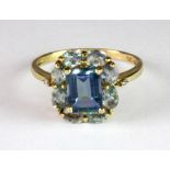 A lovely 9ct yellow gold mystic topaz cluster ring with diamond set shoulders (Q).
