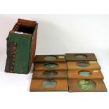 A group of eight 19th century hand tinted glass slides.