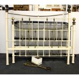 A Victorian style brass bed and frame.