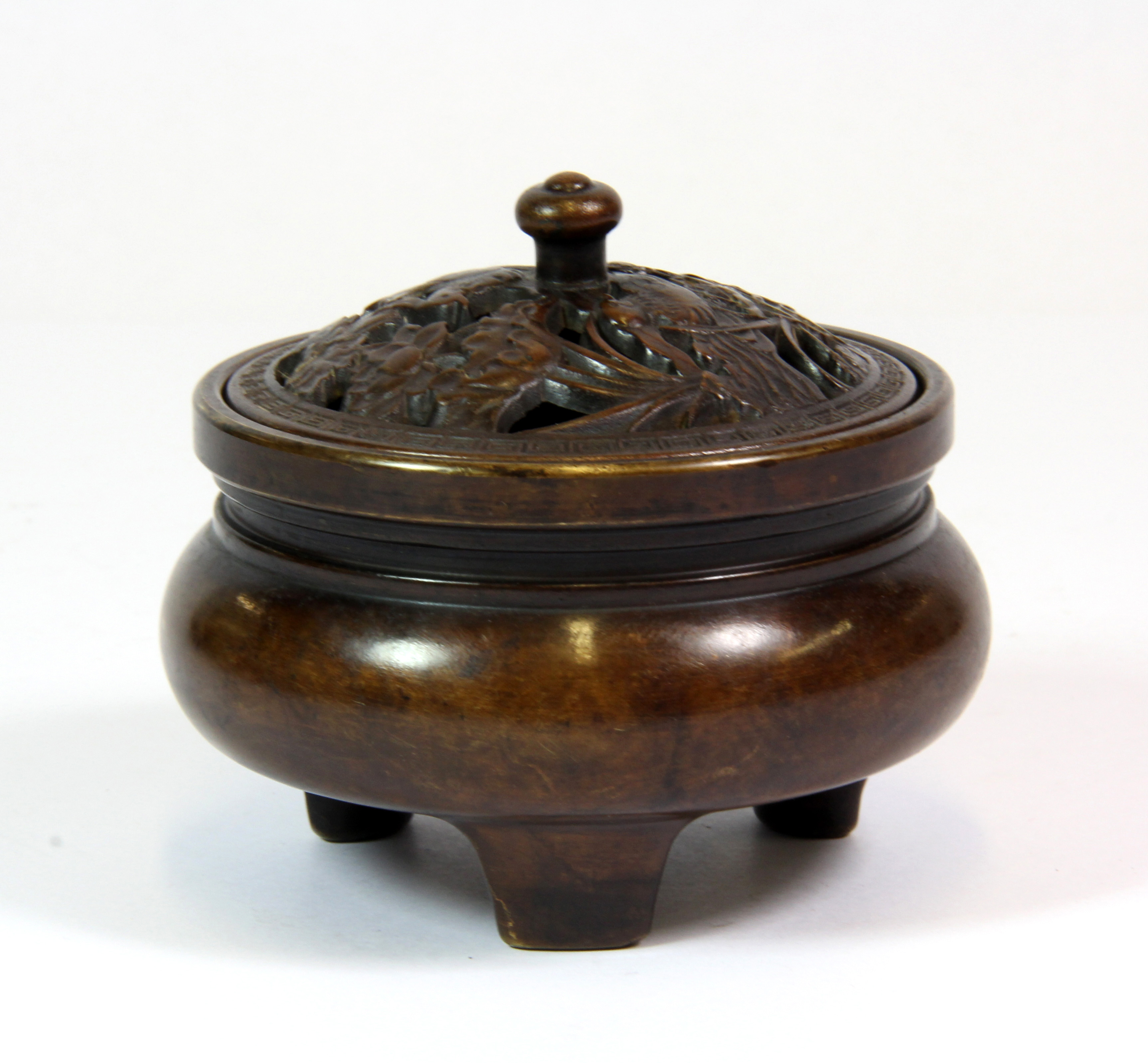 A good quality Chinese bronze censer with pierced lid depicting mandarin ducks among lotus, H. 7. - Image 2 of 4