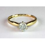 A 14ct yellow gold (stamped 14k) brilliant cut diamond solitaire ring with an antique ring box (
