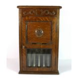 An early 20th century oak and brass hotel post box, 41cm x 26cm x 16cm.