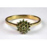 A 9ct yellow gold cluster ring set with green fancy diamonds (P.5).