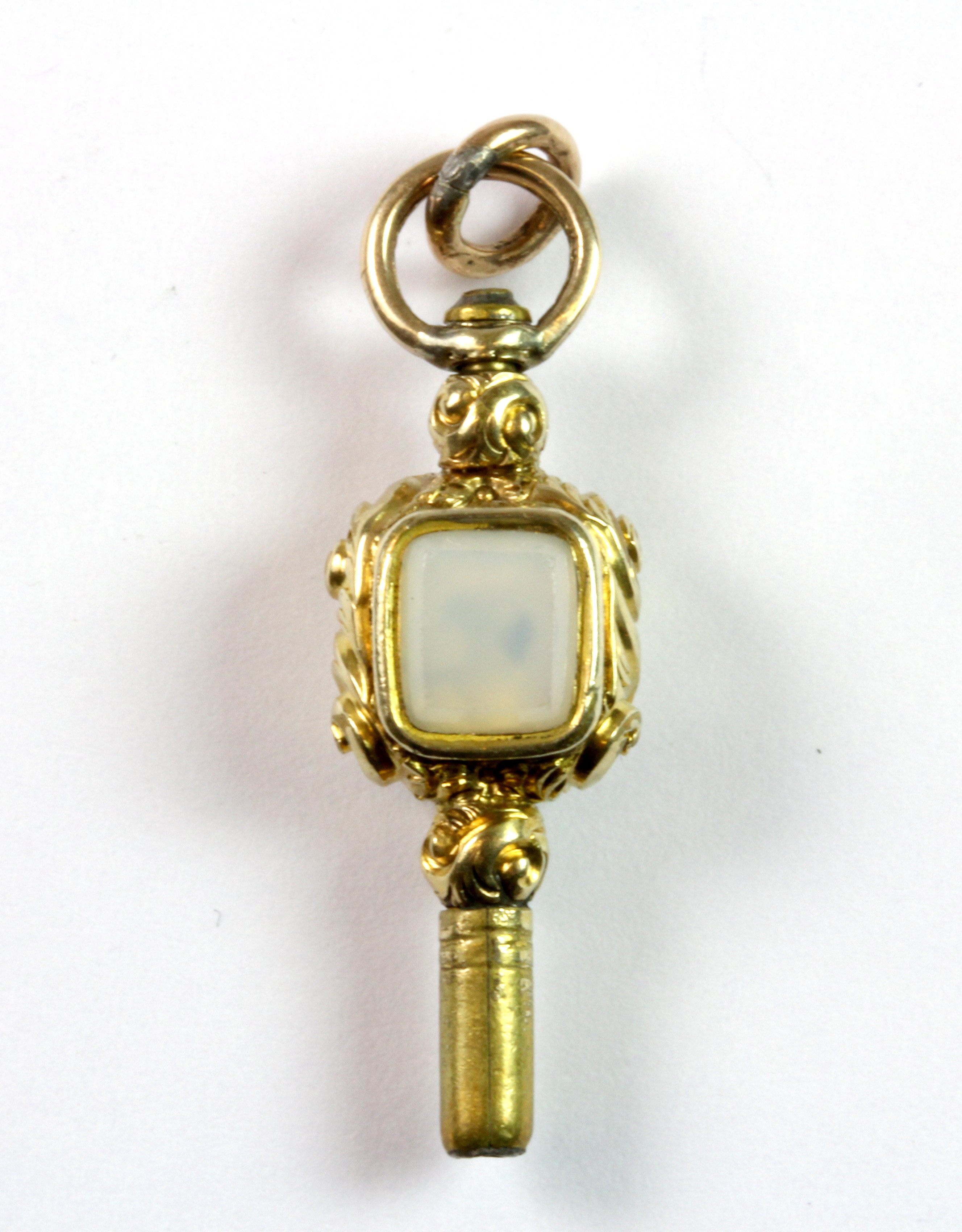 A yellow metal (tested minimum 9ct gold) agate and tourmaline set pocket watch key. - Image 2 of 2