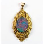 A 9ct yellow gold (stamped 9ct) opal doublet set pendant, L. 4cm.